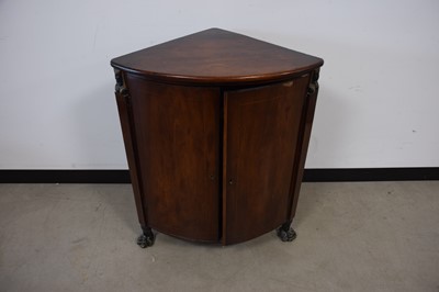 Lot 57 - A Regency style mahogany corner cabinet