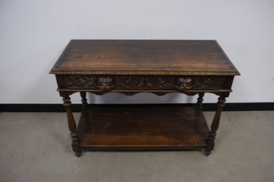 Lot 62 - A Victorian carved oak side table