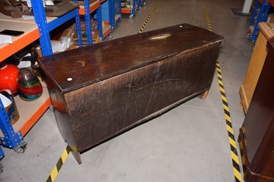 Lot 65 - An 18th century and later carved oak coffer