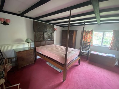 Lot 66 - An antique and later four poster bed
