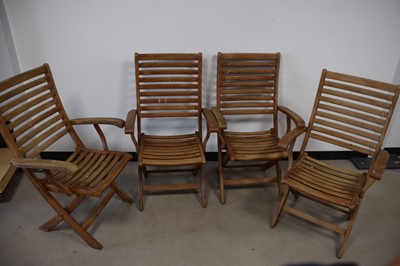 Lot 70 - Four modern teak folding garden chairs