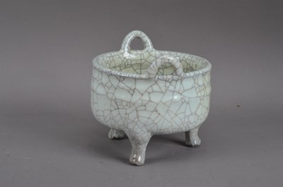 Lot 211 - A Chinese crackled glazed twin-handled footed pot