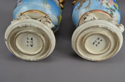 Lot 216 - A pair of Chinese damaged twin handled vases/covers