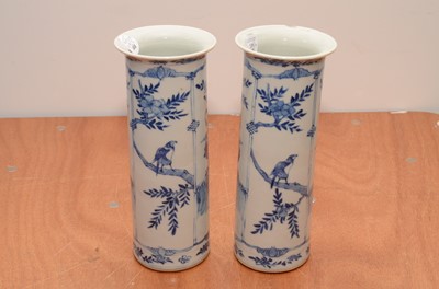 Lot 219 - A pair of late 19th/early 20th century Chinese blue and white porcelain sleeve vases