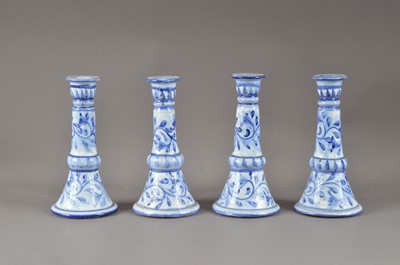 Lot 251 - A set of four late 20th century Porches earthenware candlesticks
