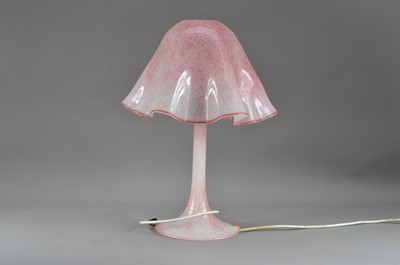 Lot 261 - A cranberry glass lamp and shade
