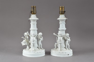 Lot 265 - A pair of damaged parion wear ceramic lamp bases
