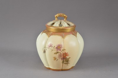 Lot 266 - A 20th century Royal Worcester urn with pierced cover