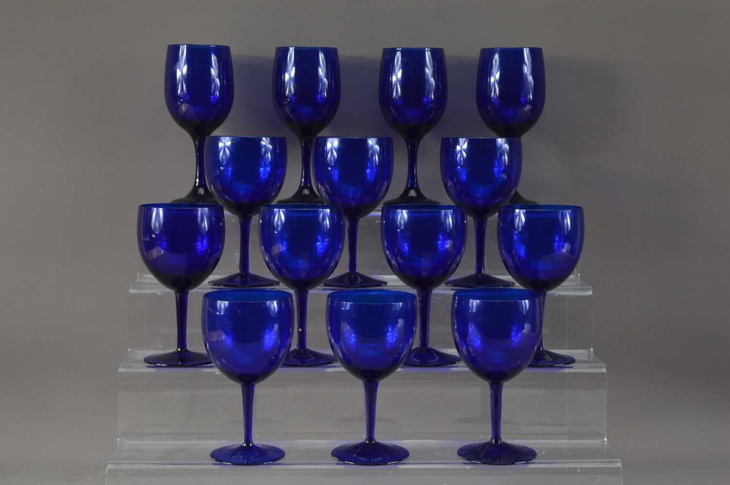 Lot 273 - A collection of blue glass goblets