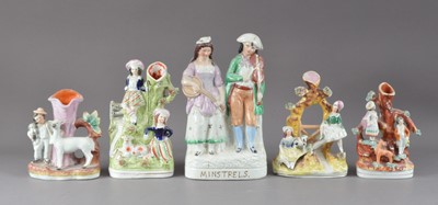 Lot 276 - Five 19th century Staffordshire figural groups and spill vases