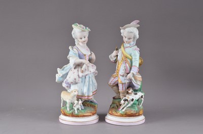 Lot 281 - A pair of early 20th century bisque porcelain figurines