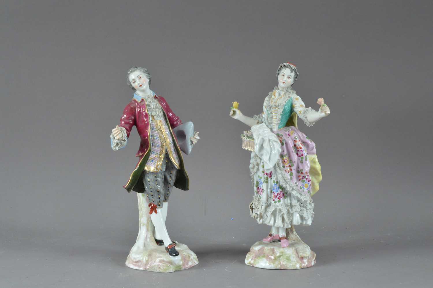 Lot 283 - A pair of early 20th century Meissen porcelain figurines