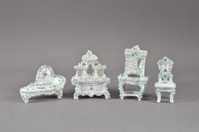 Lot 296 - A group of 20th century continental porcelain dolls house furniture