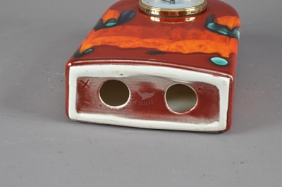 Lot 297 - A Poole pottery mantle clock