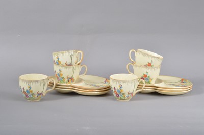 Lot 350 - A set of six Crown Devon tea plates and cups