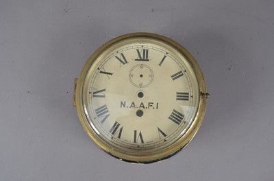 Lot 399 - An early to mid 20th century N.A.A.F.I. wall clock