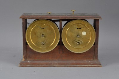 Lot 404 - An early 20th century 'Reliable Chess timer' in an oak case