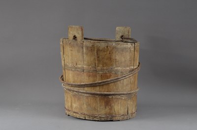 Lot 407 - An antique wood and metal bound bucket