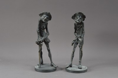 Lot 413 - A pair of spelter candlesticks