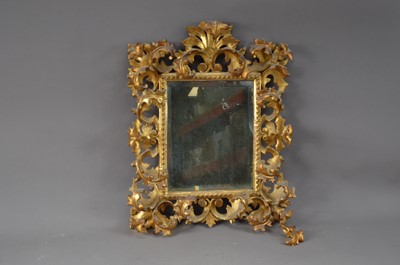 Lot 420 - An early 20th century decorative rococo style gilt mirror