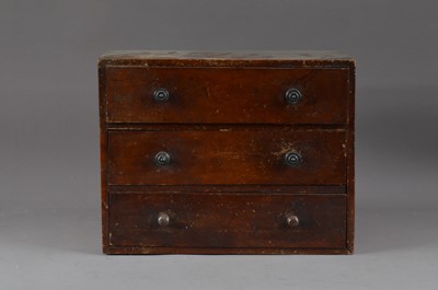 Lot 474 - A small early 20th century mahogany three drawer cabinet, with turned handles, some wear, 28cm x 35.5cm