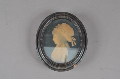 Lot 480 - An 18th century grisaille portrait of a lady
