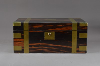 Lot 484 - A Victorian Coromandel and brass campaign style writing slope