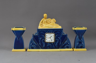 Lot 536 - A c.1920's French ceramic art nouveau style clock garniture