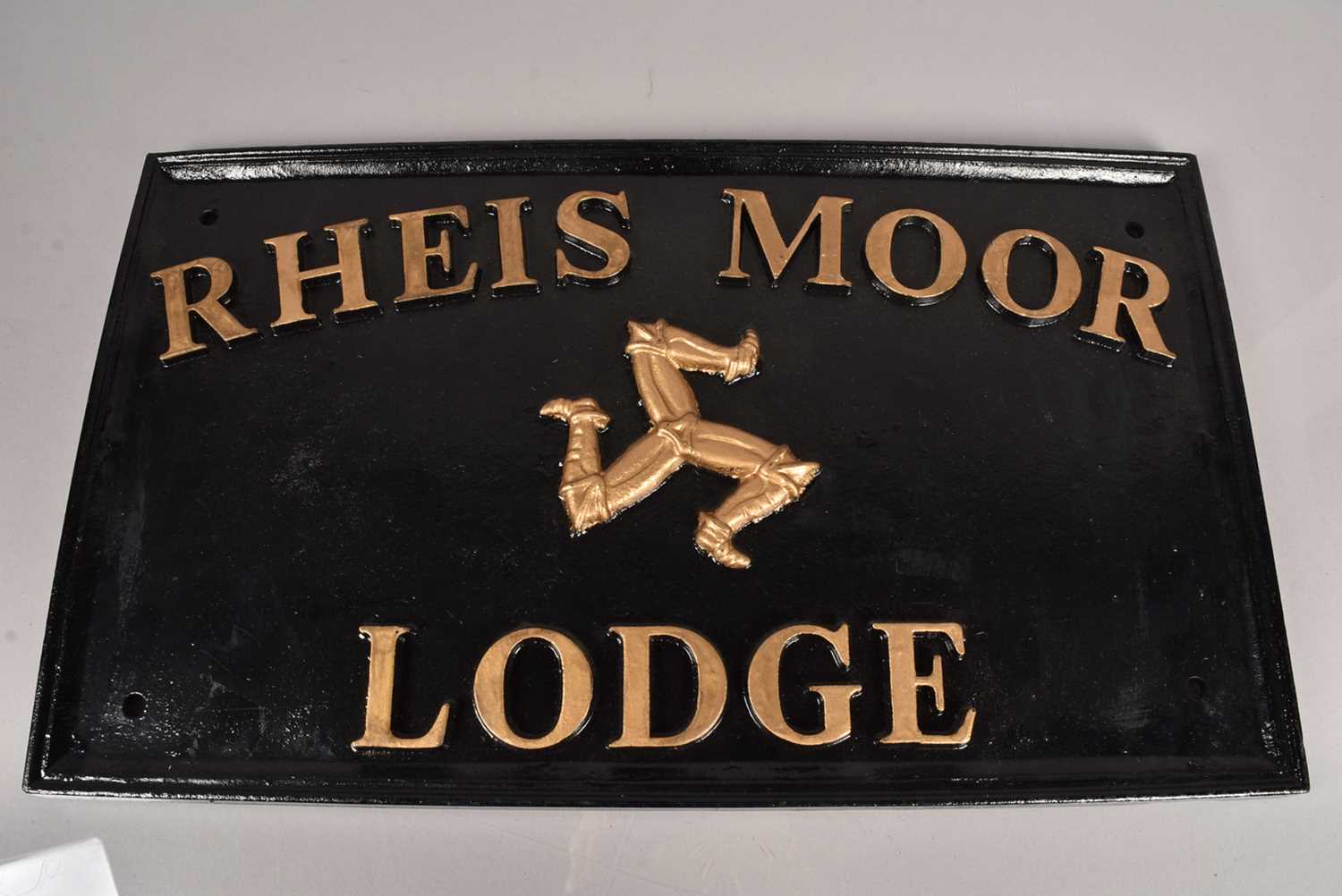 Lot 63 - A cast iron sign for the Rheis Moor Lodge
