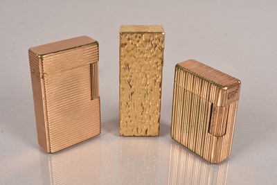 Lot 72 - Two gold plated ST Dupont pocket lighters