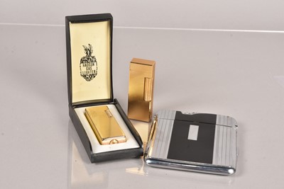 Lot 86 - A gold plated Dunhill pocket lighter