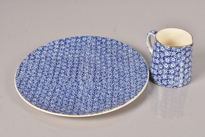 Lot 141 - British India Steam Navigation Company 'Blue Flower' pattern plate and cream jug