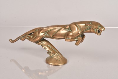 Lot 166 - A brass Jaguar mascot figure
