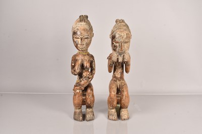 Lot 252 - A pair of Seated Tribal Figures