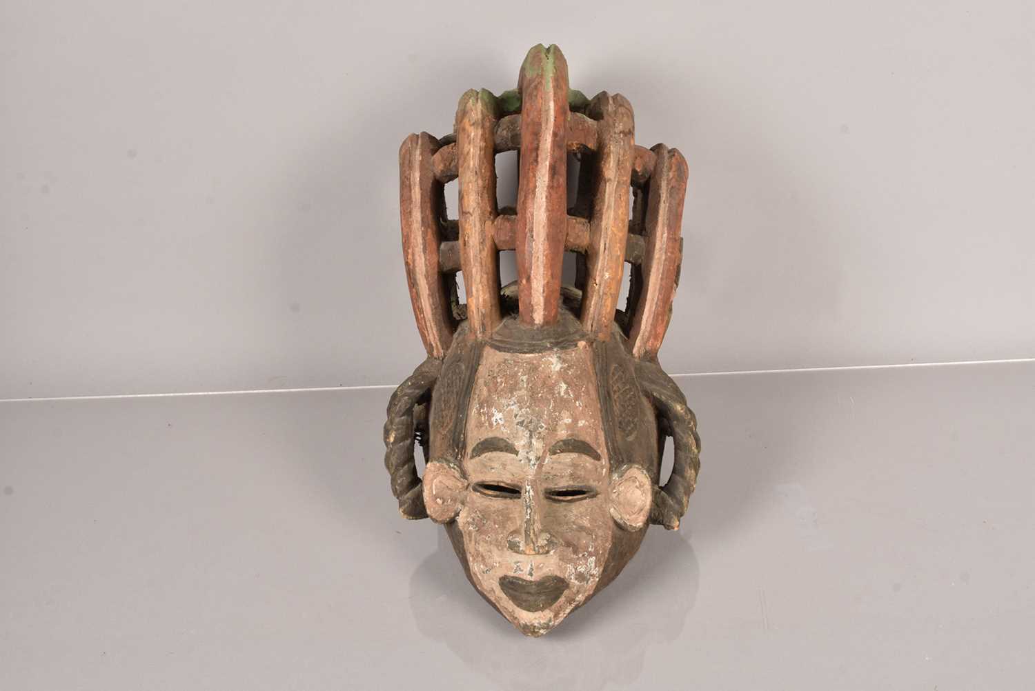 Lot 254 - An African Agbogho Mmwo Helmet Mask