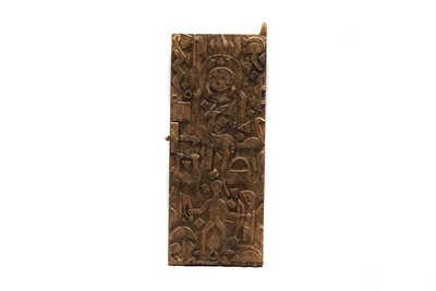 Lot 277 - An African carved wooden door