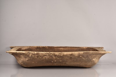 Lot 283 - An African carved wooden dough trough