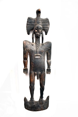 Lot 284 - A large carved wooden African Male Figure