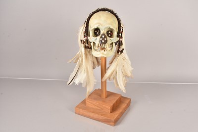 Lot 287 - An African Asmat Style Ancestor Skull