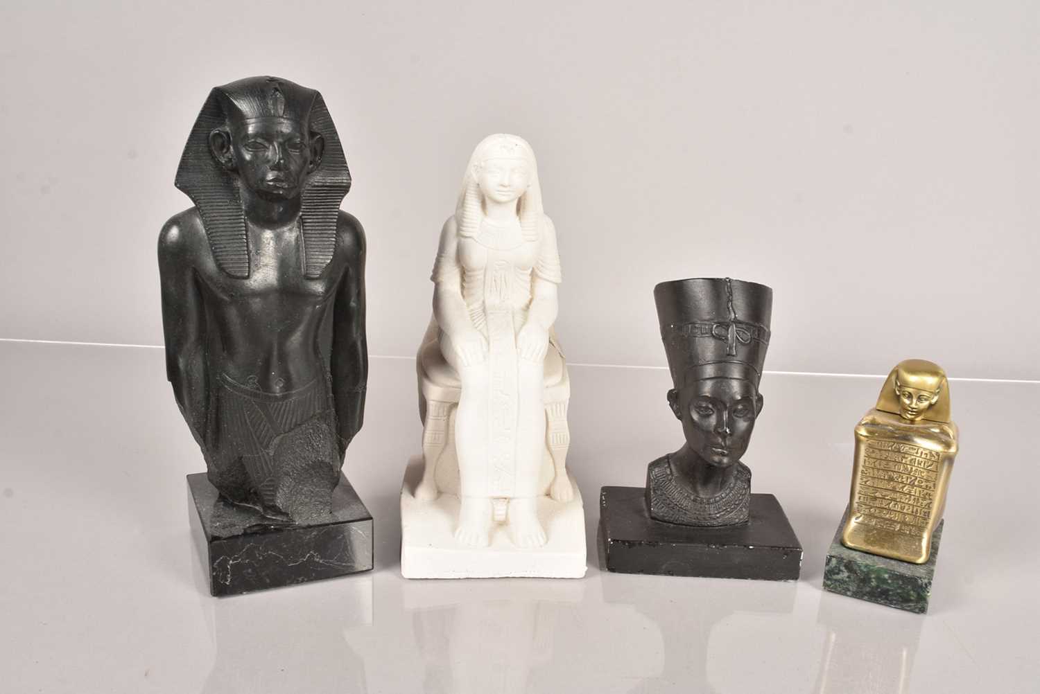 Lot 296 - Four Egyptian figural models,