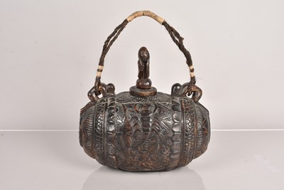 Lot 299 - An African carved container