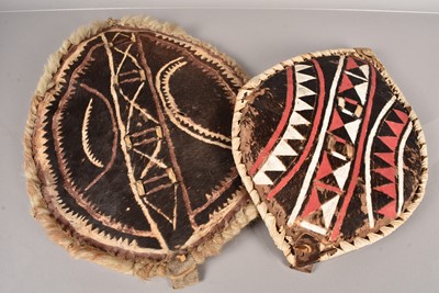 Lot 300 - Two small decorative African Animal Hide Shields