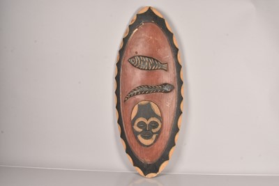 Lot 303 - A wooden African Shield