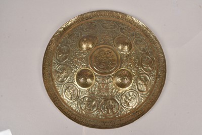 Lot 306 - A Persian brass circular shield