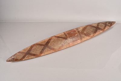 Lot 310 - A carved wooden shield