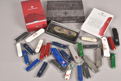 Lot 347 - Victorinox - a collection of various Swiss Army Knives