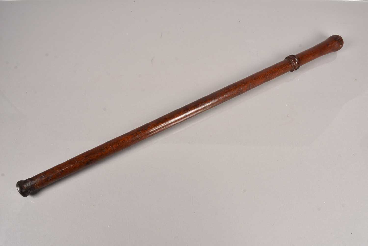 Lot 450 - A Vintage metal tipped Truncheon