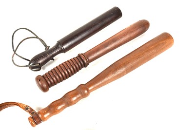 Lot 474 - Three wooden Truncheons