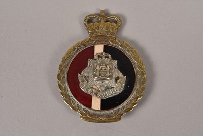 Lot 497 - An East Surrey Regiment Car badge