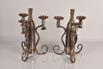 Lot 523 - A pair of Trench Art Candelabras